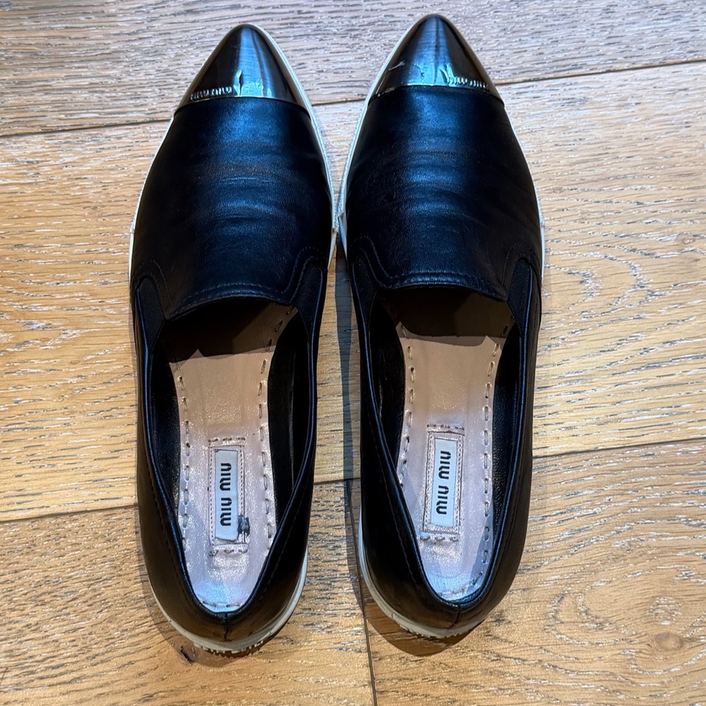 Miu Miu Black Leather Flats with Silver Accents